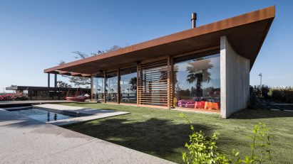 Overhanging weathered steel canopy