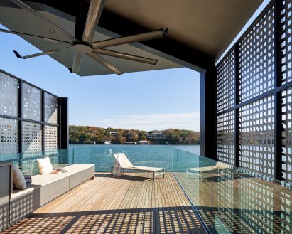 Glass balustrades wrap the upper deck