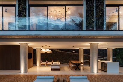 Pool deck and communal space at night