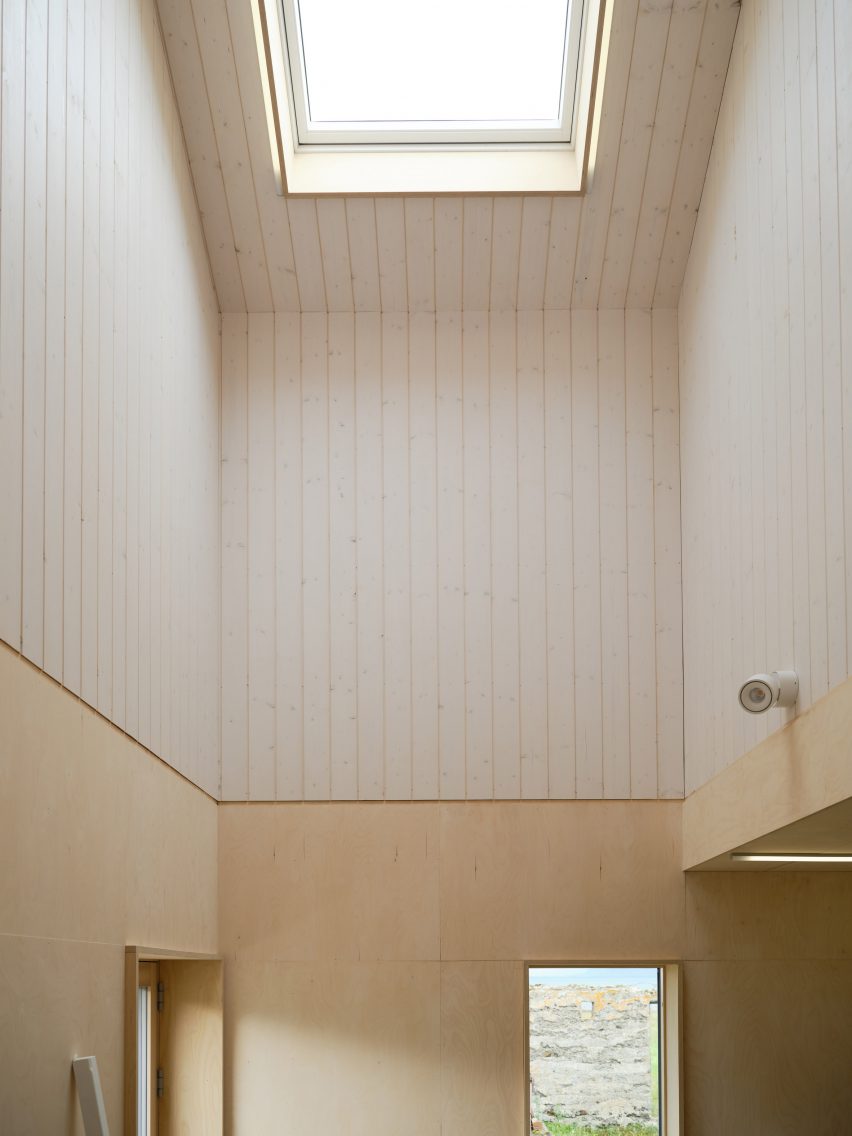 A wood-lined artist studio