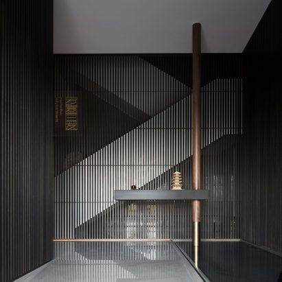 Entrance to Sui Han San You restaurant with slatted wooden screens