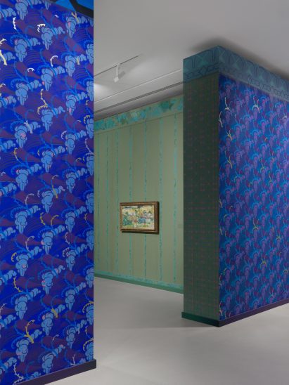 Blue and green wallpaper with geometric patterns