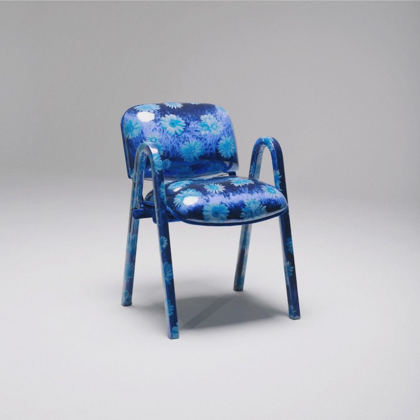 Armchair covered in blue floral print