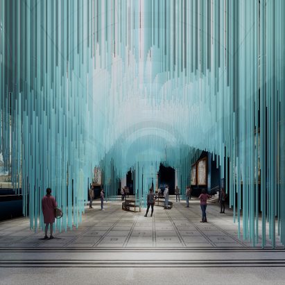 Visitors walking through a blue light installation