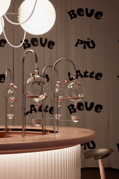 Pink bar with breakers and breast-shaped cups in Korova Milk Bar installation from Clockwork Orange