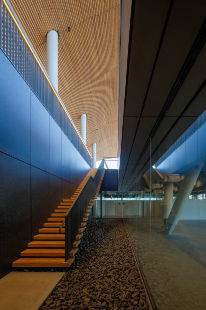 A corrugated steel roof covers the structure
