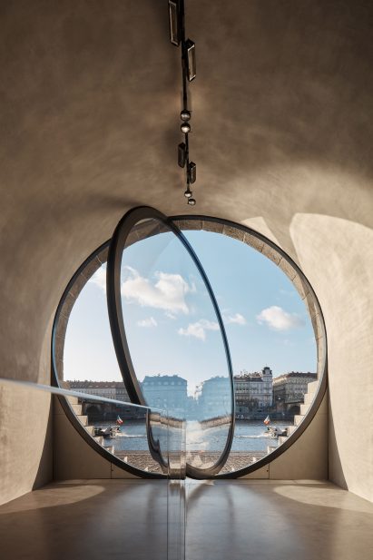 The circular window is pivoted to open