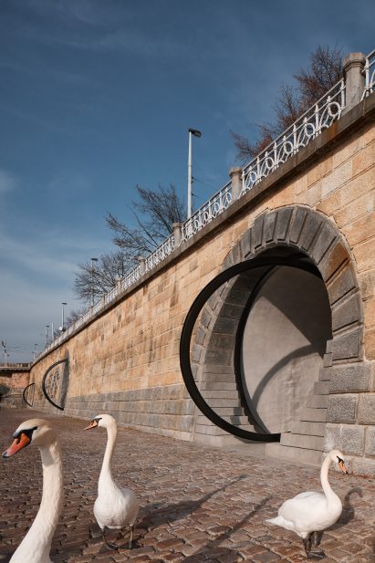 The commercial spaces along the Prague riverfront have pivoting windows