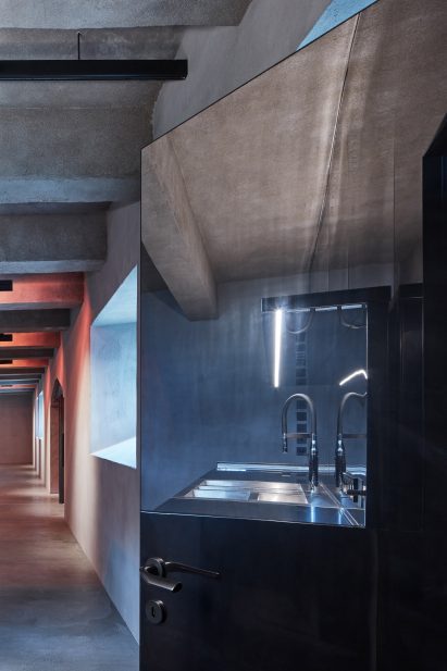 A door reflects the surrounding room