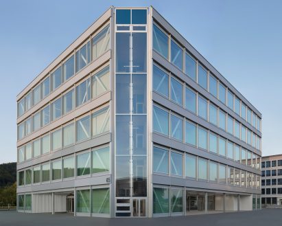Glazed staircase corners of Roche Multifunctional Workspace Building is the third building by Christ & Gantenbein