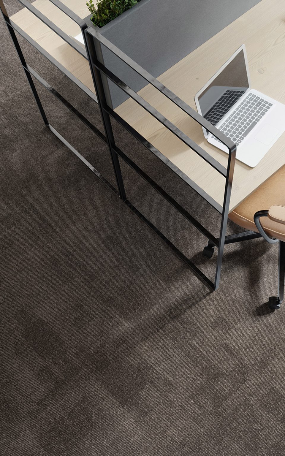 A photograph of the grey and brown carpet tiles