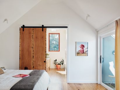 The master suite reveals the house's gabled roof