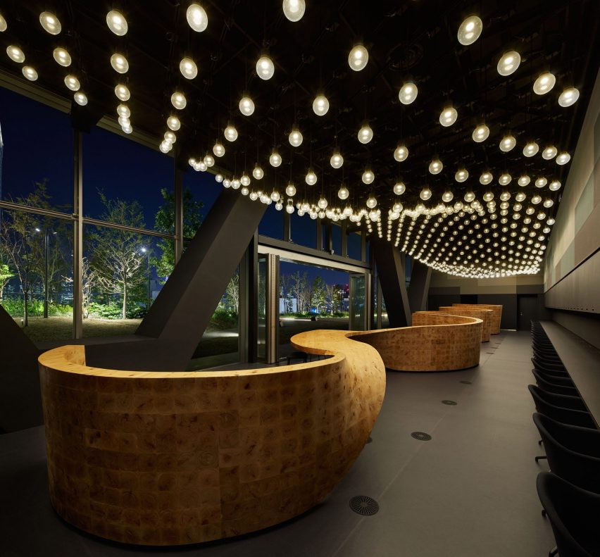 Night view of Pangaea co-working by Snøhetta for Digital Garage