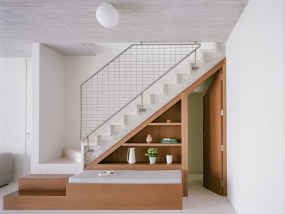 A staircase with an aluminium balustrade