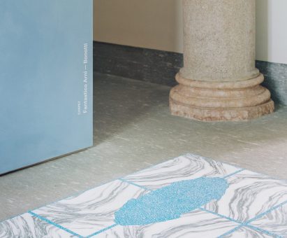 Close-up of the Stone House carpet with book-match pattern in blue and white stone