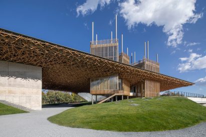 Grassy mounds extend around the surrounding area of the Yang Liping Performing Arts Center