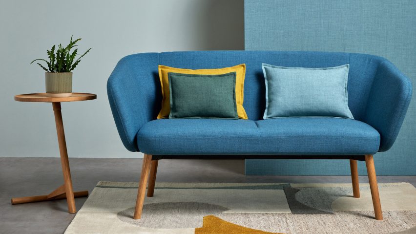 A sofa and cushions covered in Sumi fabrics