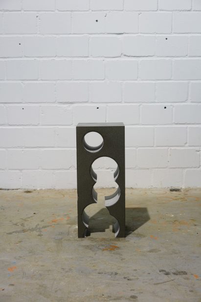 Teil 4 tall Silbergrau QS side table with pattern of holes rising through its middle