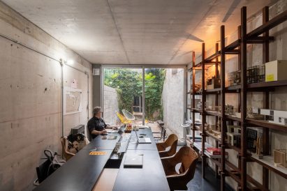The typological concept of the project is based on three vertical houses