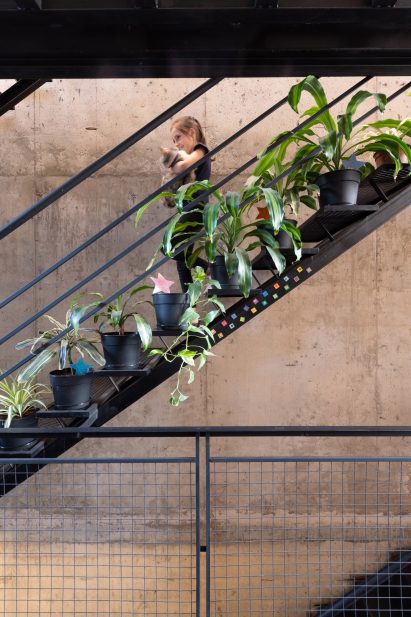 A staircase is located in each unit