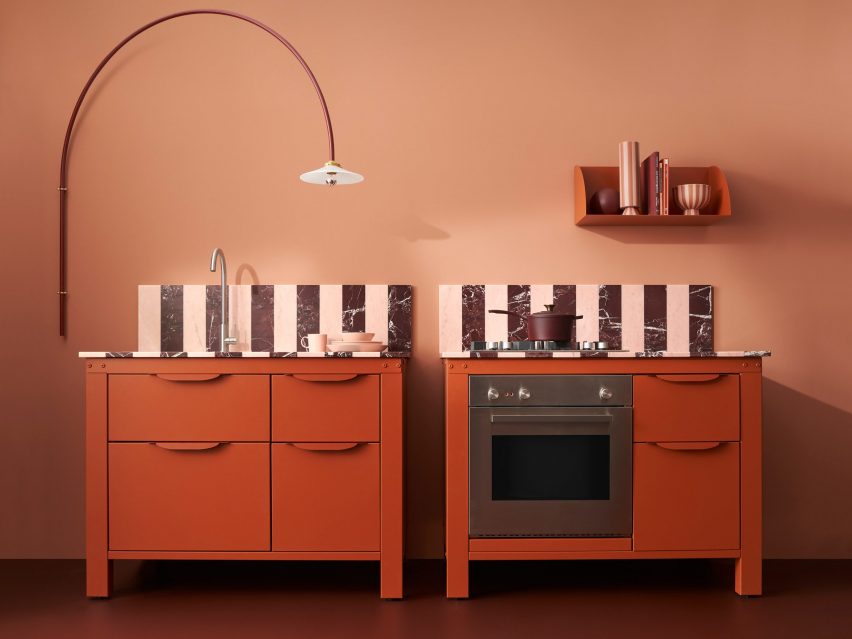 Two pink and red kitchen units by Very Simple Kitchen