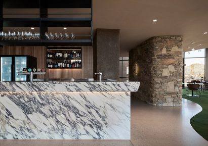 A large stone bar is located at the clubhouse 