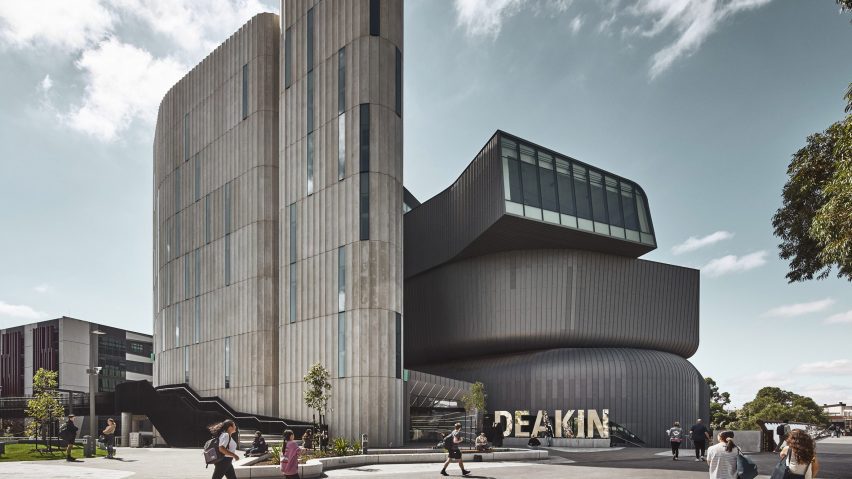 Deakin Law School by Woods Bagot features zinc cladding and fluted concrete towers