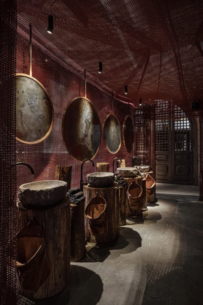Mesh lines the ceiling and walls of the bathrooms at Virgin Izakaya Bar