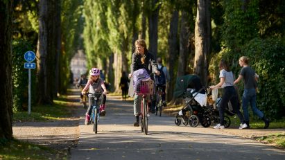 Cyclists in green neighbourhood