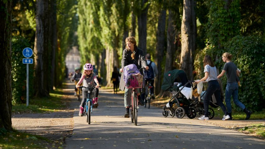 Cyclists in green neighbourhood