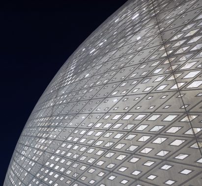 Perforated cladding surrounding the stadium