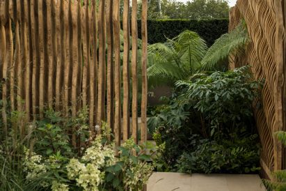 Wooden screen by Jan Hendzel in front of Armourcoat wall in The Boodles Secret Garden