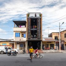Giant shutters front Bardales fitness centre in Ecuador by Natura Futura