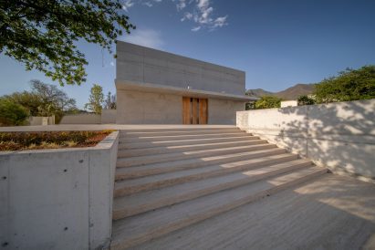 Concrete and travertine chapel