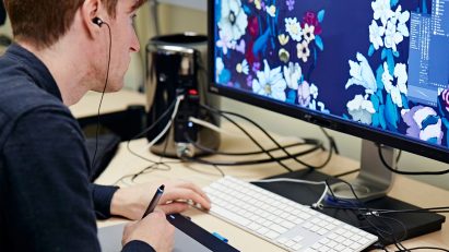 A student working on a digital design project