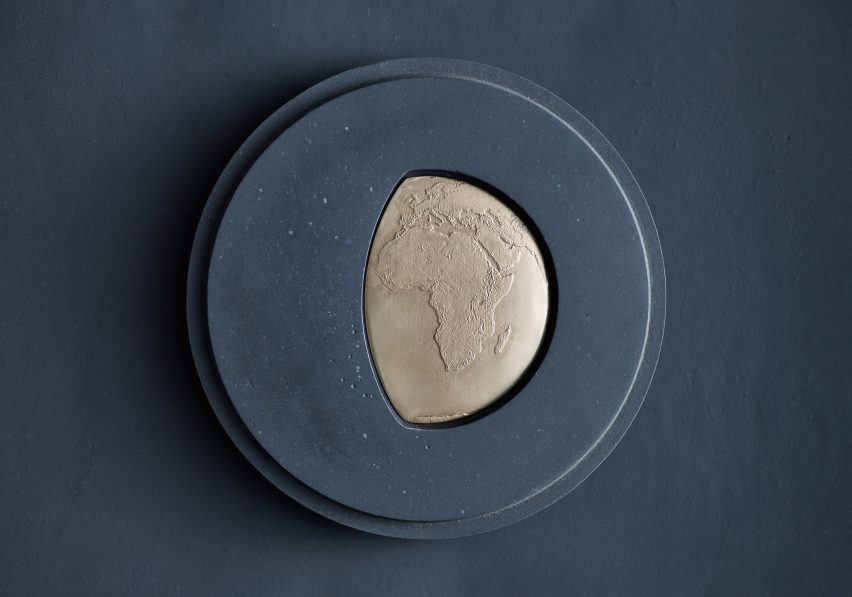 A blue and gold Earthshot Prize medal