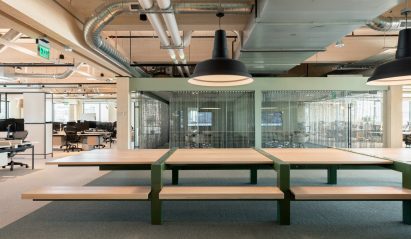 Large communal desk in Education First office