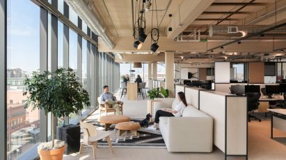 Breakout are with sofas in office interior in Denver, Colorado