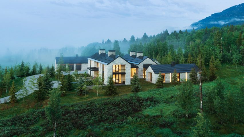 The home is surrounded by trees