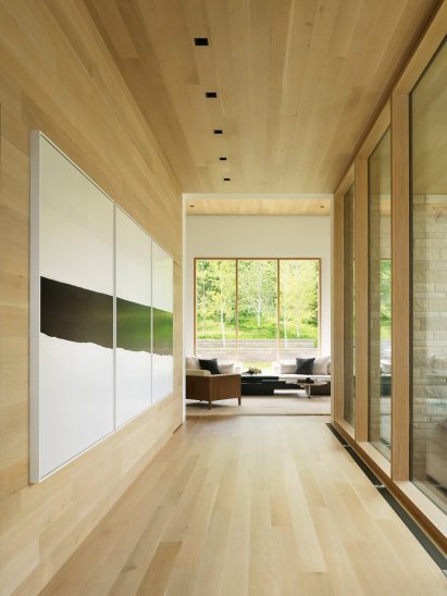 Wood lines the walls and floors of Five Shadows