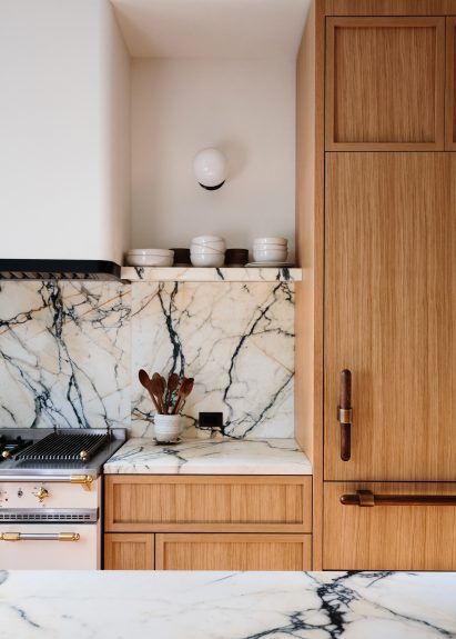 Kitchen detail of marble backsplash and counters