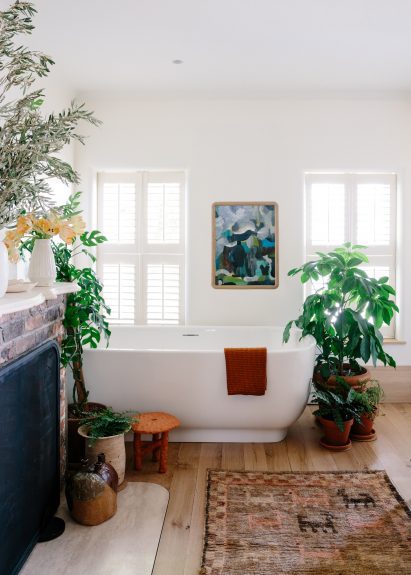 Upstairs bathroom with fireplace and freestanding tub