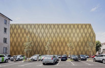Gold metal-clad cinema