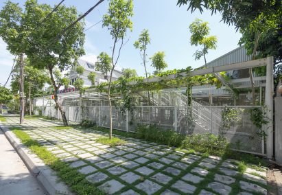 Plants and greenery are picture growing up the fence of My Montessori Garden