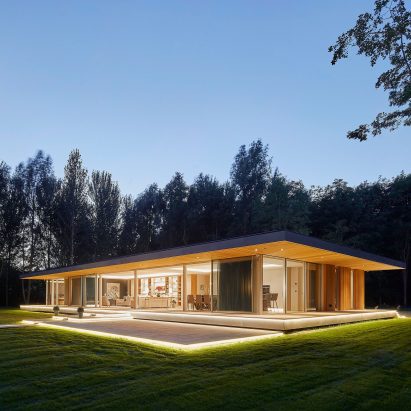 Night view of House in The Lakes by Yoo, by Broadway Malyan