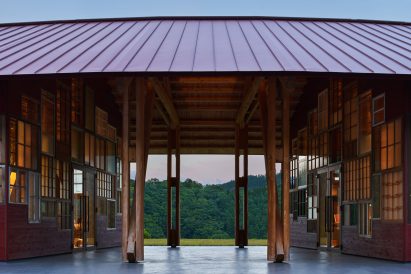 A large roof stretches over multiple volumes at Kamikatsu Zero Waste Center 