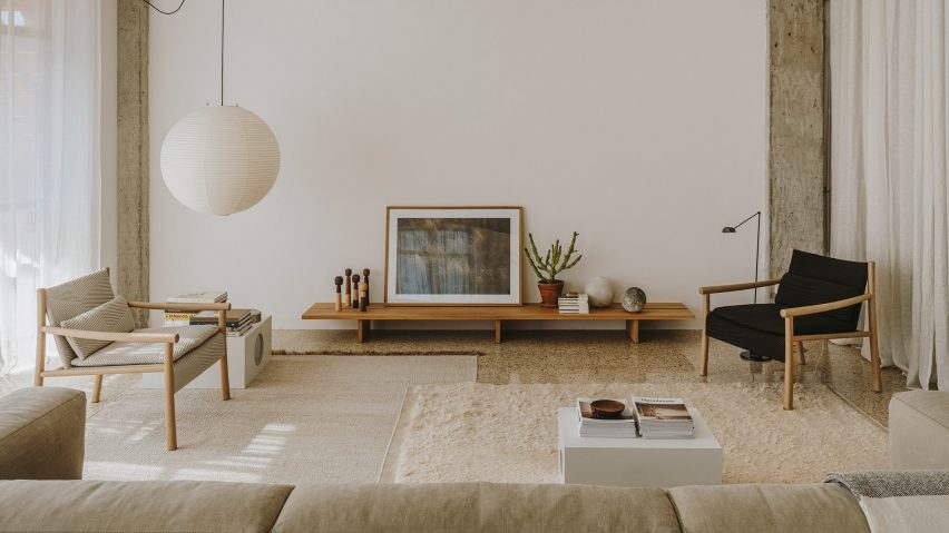 Two Katu chairs facing each other in a pared-back living room interior