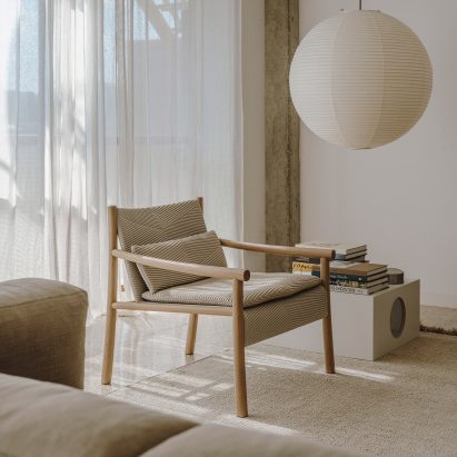 Katu chair in a pared-back living room interior