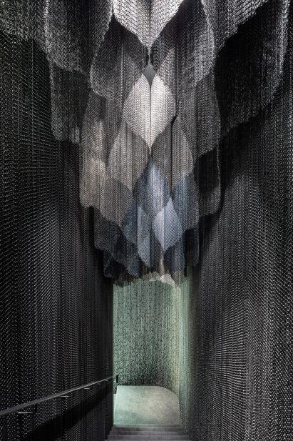A photograph of Kengo Kuma installation in Gaudi's Casa Batlló with Kriskadecor chains
