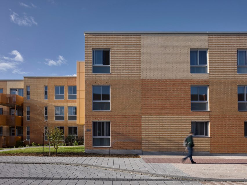 Montreal housing complex by Saia Barbarese Topouzanov renovated with colourful spiral staircases